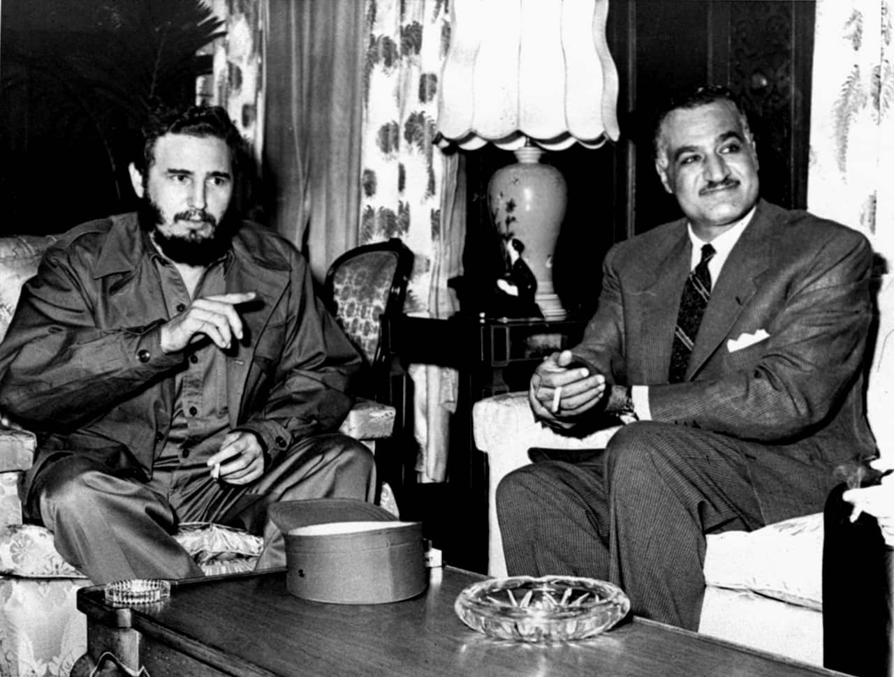 Cuba's Fidel Castro, left, and Gamal Abdel Nasser, President of United Arab Republic, confer, September 28, 1960 at the New York headquarters of the UAR. (AP Photo)