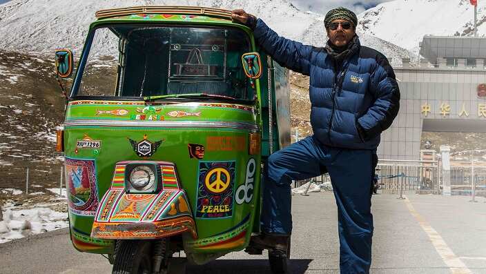 Documentary Film-maker Wajahat Malik with Rickshaw.