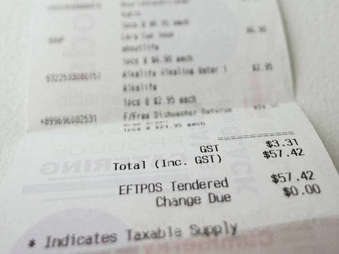 The GST component is seen printed on a grocery receipt in Canberra, Monday, Nov. 2, 2015. (AAP Image/Lukas Coch) NO ARCHIVING