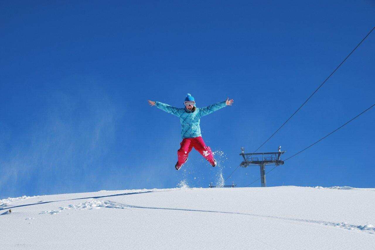 Emmie Phillips of Jindabyne playing in the fresh snow in Perisher Blue in the Snowy Mountains, New South Wales. 