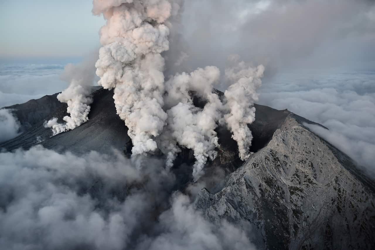 the volcano of Mt. Ontake, a volcano spewing gray smoke up into the sky in between Gifu and Nagano Prefecture, central Japan on Sept. 27, 2014. The voclcano, straddling the two prefectures, erupted for the first time in 7 years.