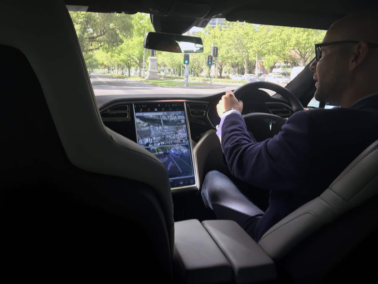 The Tesla Model S vehicle's autopilot and auto steer function enables the car to sense surrounding traffic and steer without drivers touching the wheel.