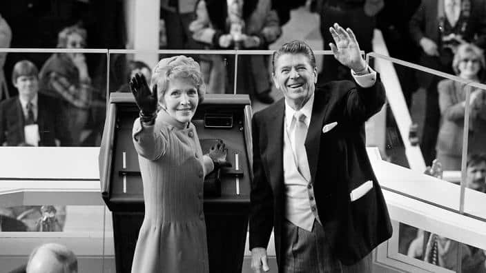 President Ronald Reagan and first lady Nancy Reagan wave to onlookers in Washington following the swearing in ceremony.