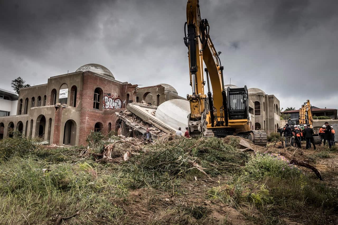 The "Taj on the Swan" is demolished after protracted legal battles in Peppermint Grove, Perth, Monday, Oct. 3, 2016. (AAP Image/Tony McDonough) NO ARCHIVING