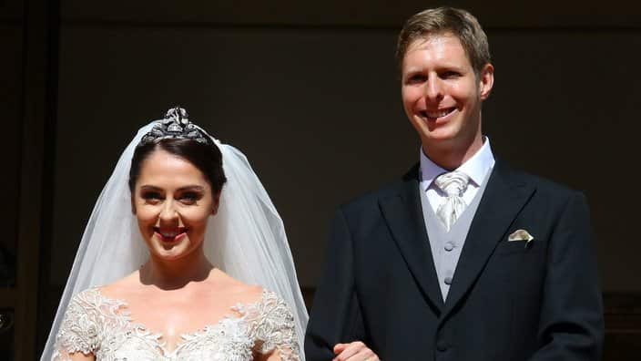 Albania's Crown Prince Leka II walks with his wife Elia Zaharia during their wedding ceremony in Tirana, Albania, Saturday Oct. 8, 2016. (AP Photo/Hektor Pustina)