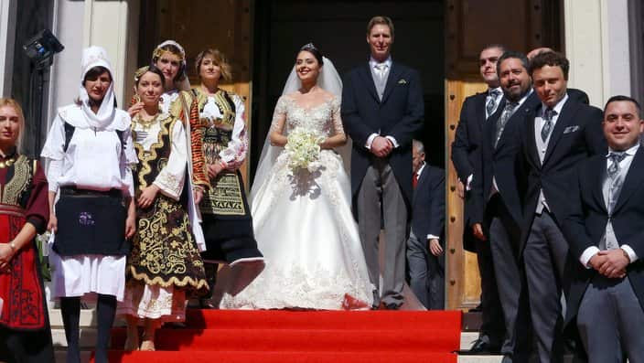 Albania's Crown Prince Leka II and his wife Elia Zaharia walk after their wedding ceremony in Tirana, Albania, Saturday Oct. 8, 2016. (AP Photo/Hektor Pustina)