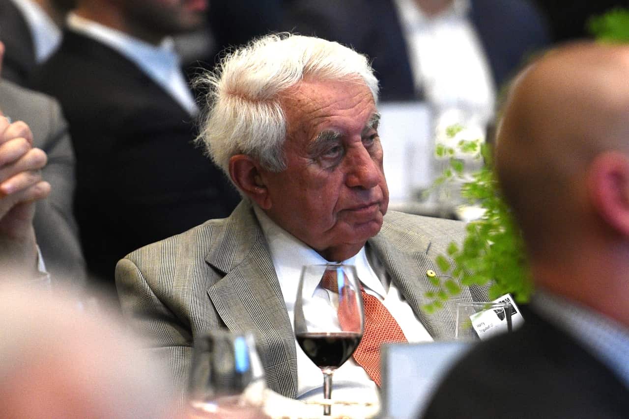 Property developer Harry Triguboff watches on as Federal Treasurer Scott Morrison addresses the Urban Development Institute of Australia, (UDIA), luncheon in Sydney, Monday, Oct. 24, 2016. (AAP Image/Dan Himbrechts) NO ARCHIVING