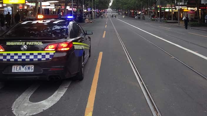 The main artery of Melbourne CBD, Swanston St was closed for cars and trams, and semi-closed for the pedestrians