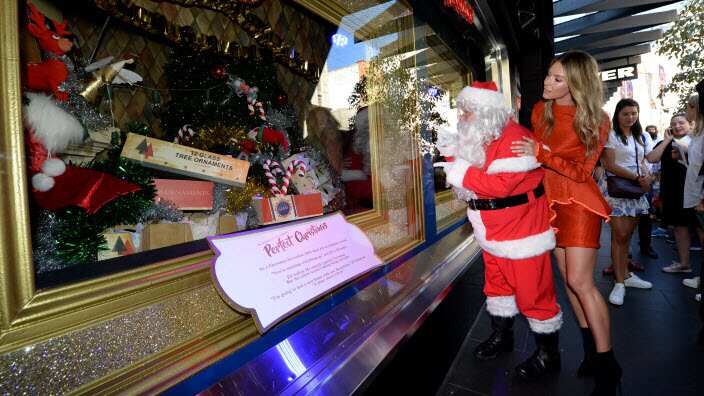 Santa with the Face of Myer Jennifer Hawkins at the unveiling of the Myer Christmas animated windows in Melbourne, Sunday