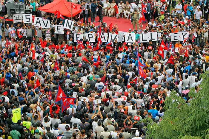 Nepalese Newar community people gather during a protest against government in Kathmandu, Nepal, Wednesday, June 19, 2019.