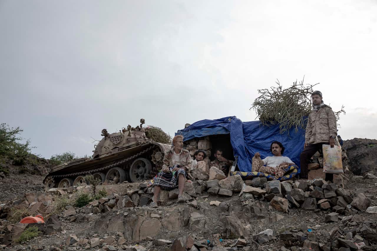 fighters from a militia known as the Security Belt, that is funded and armed by the United Arab Emirates at frontline with Houthi rebels, in Dhale province.