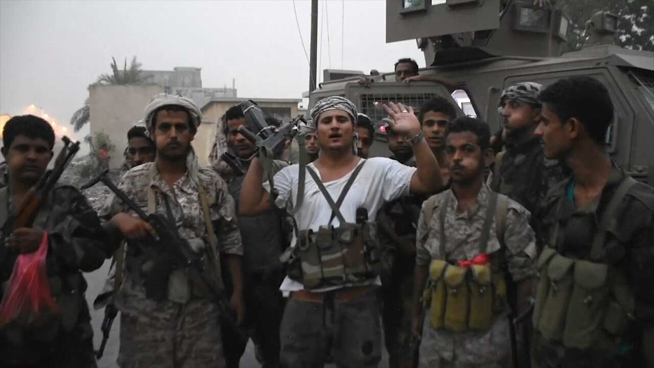 Southern Transitional Council separatist fighters line up before storming the presidential palace in the southern port city of Aden, Yemen.