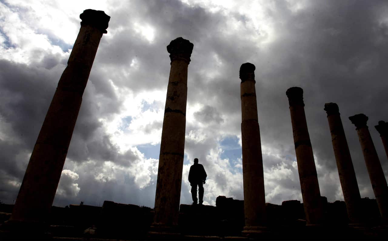 Tourists walk around the in the ancient Romanian city of Jerash, Jordan, north of Amman which is one of the old Decapolis