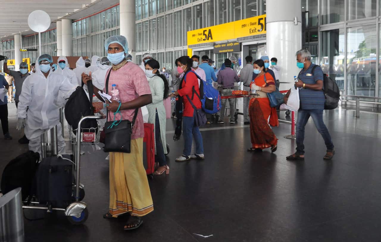 Indian stranded in Dhaka arrived at special flight Vande Bharat at NSCBI Airport  during nation wide lock down 4 imposed in the wake of COVID 19 Coronavirus pandemic in Kolkata, India on May 18, 2020.  (Photo by Saikat Paul/Pacific Press/Sipa USA)