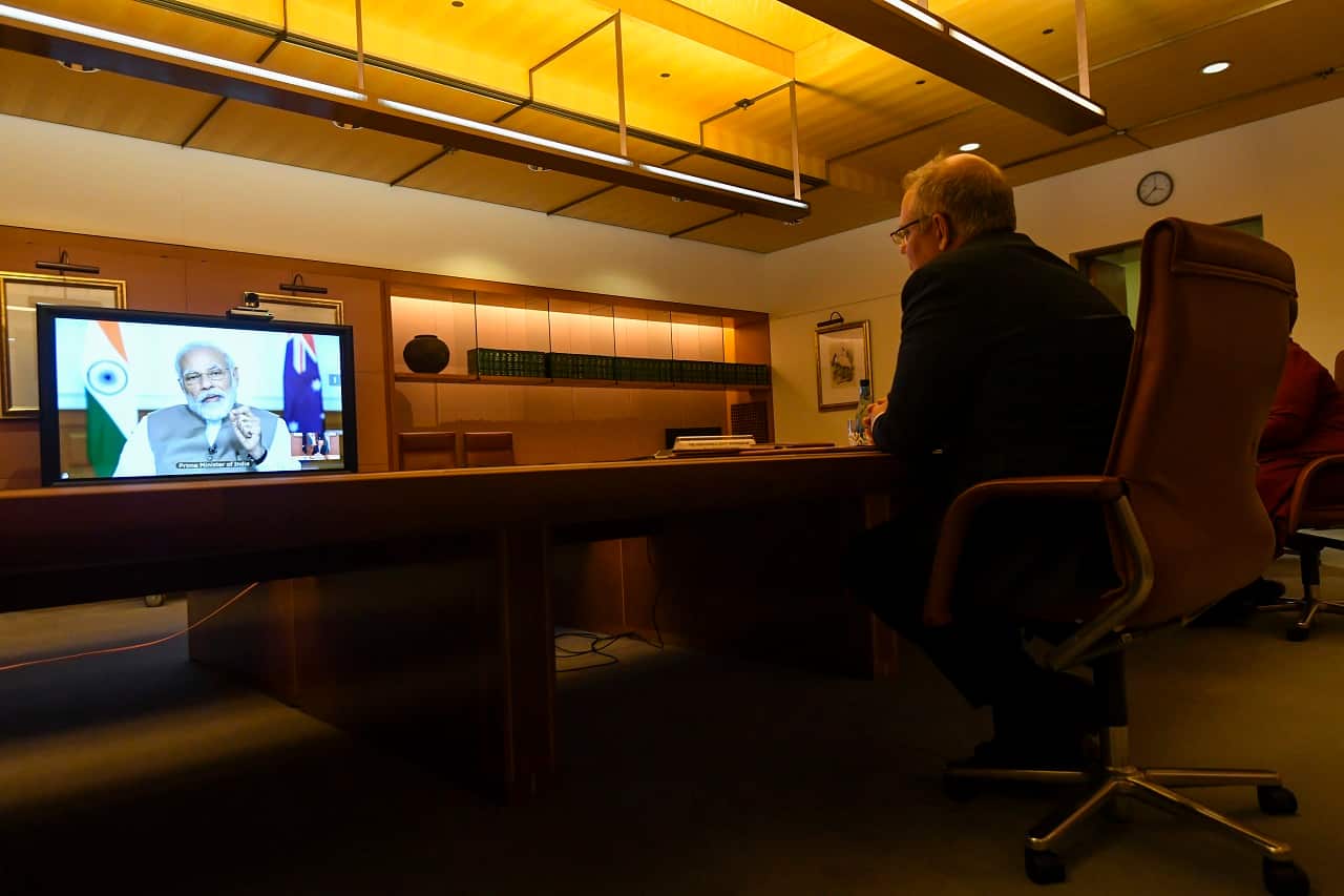 Australian Prime Minister Scott Morrison speaks to Indian Prime Minister Narendra Modi during the 2020 Virtual Leaders Summit between Australia and India at Parliament House in Canberra, Thursday, June 4, 2020. (AAP Image/Lukas Coch) NO ARCHIVING