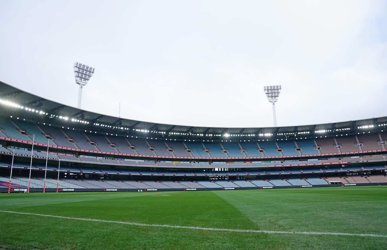 A general view of an empty MCG during the Round 5 AFL match between the Melbourne Demons and the Richmond Tigers at The MCG in Melbourne, Sunday, July 5, 2020. (AAP Image/Scott Barbour) NO ARCHIVING, EDITORIAL USE ONLY