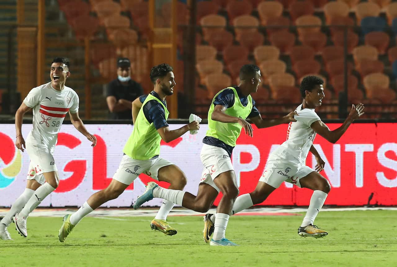 epa08619195 Zamalek's Osama Faisal (R) celebrates after scoring during the Egyptian Premier League soccer match between Zamalek SC and Al Ahly SC in Cairo, Egypt, 22 August 2020  EPA/KHALED ELFIQI