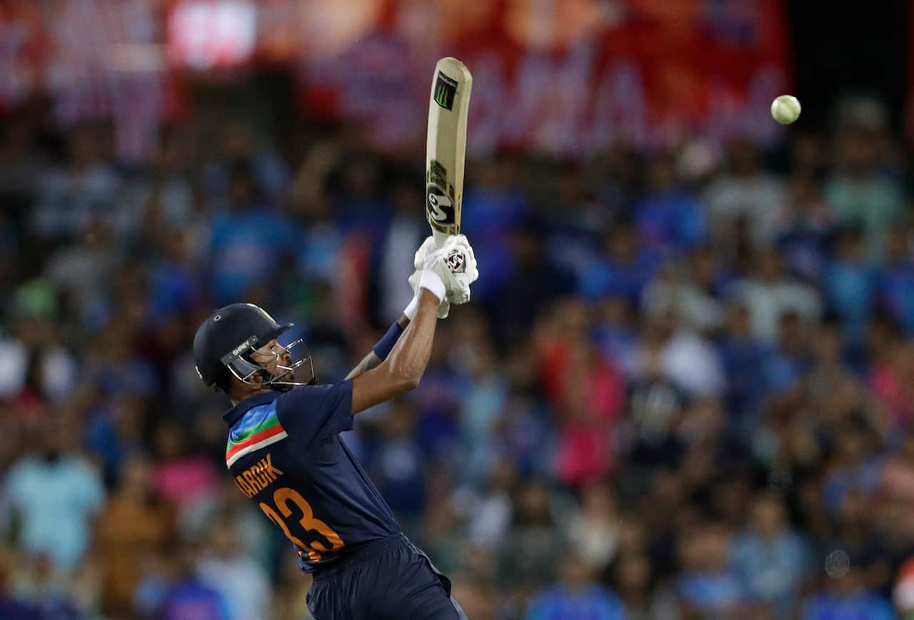 India's Hardik Pandya plays a shot during the second T20 international cricket match between Australia and India at the Sydney Cricket Ground in Sydney, Australia, Sunday, Dec. 6, 2020. (AP Photo/Rick Rycroft)