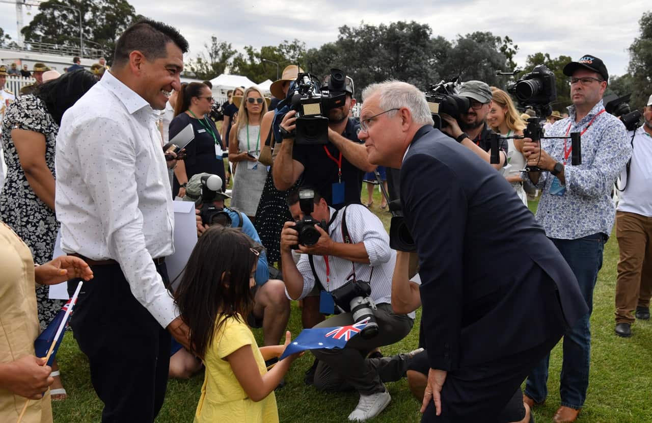 PM Scott Morrison speaks to new citizens during an Australia Day Citizenship Ceremony and Flag Raising event in Canberra, Tuesday, January 26, 2021.