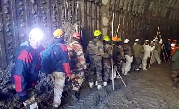NDRF, SDRF, ITBP and Army personnel during search and rescue operation
