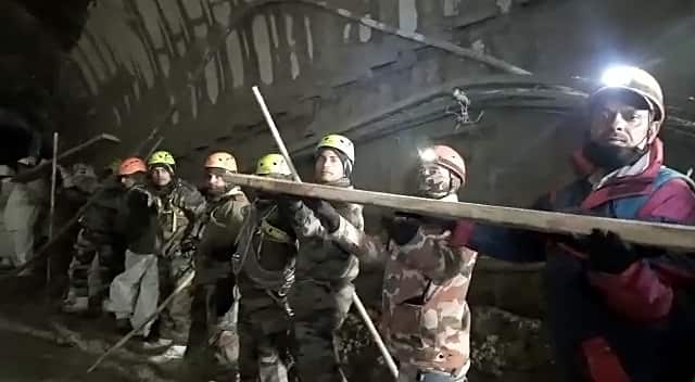 NDRF, SDRF, ITBP and Army personnel during search and rescue operation