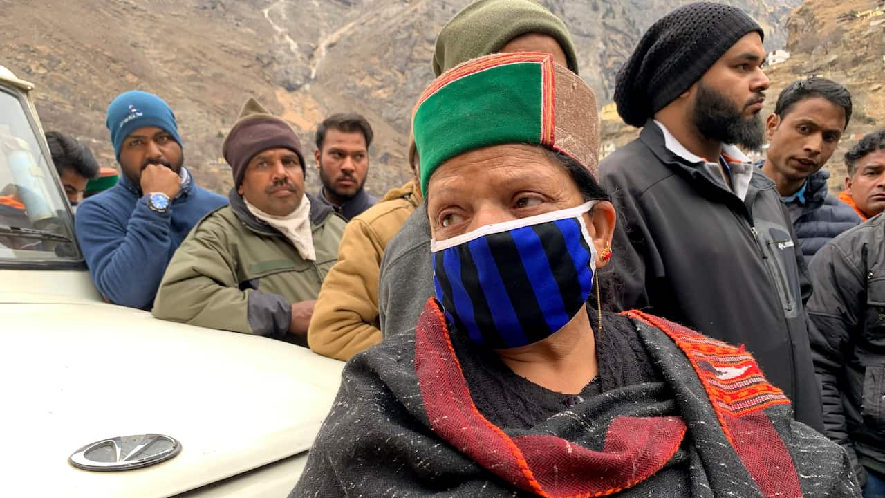 Rani Devi, from Himachal Pradesh state searches for her husband Teerath Singh who worked at the hydroelectric power plant and is missing since a part of a Himalayan glacier broke off Sunday sending a devastating flood downriver in Tapovan area