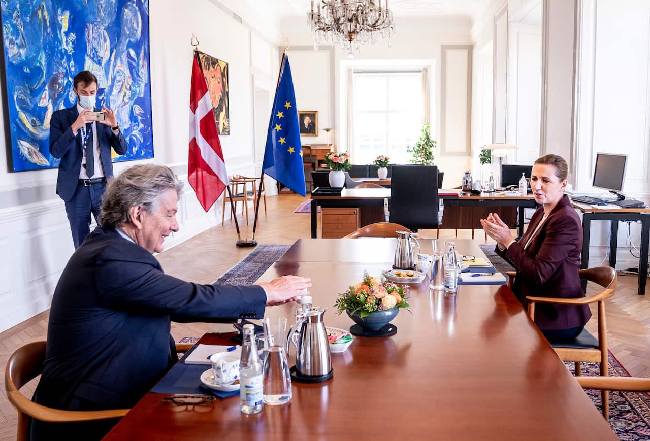 EU Commissioner Thierry Breton meets with Denmark Prime Minister Mette Frederiksen, right, at the Prime Minister's Office in Copenhagen