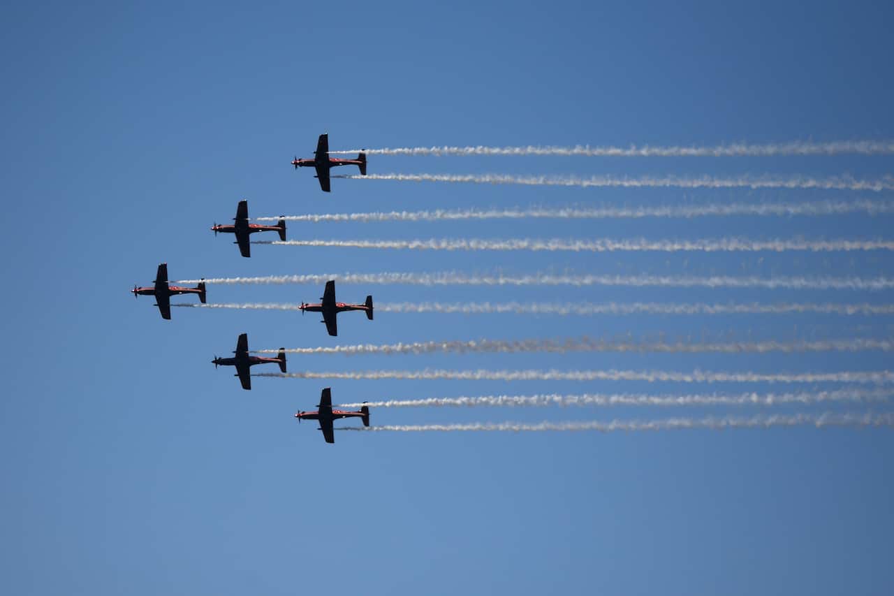RAAF Roulettes aircrafts perform a flight show marking the 100th anniversary of the The Royal Australian Air Force, Canberra, Wednesday, March 31, 2021. (AAP Image/Lukas Coch) NO ARCHIVING