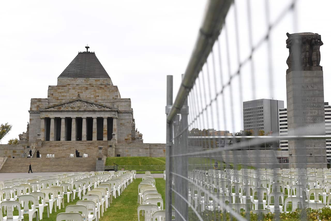 Temporary fences are seen outside of the Shrine of Remembrance in Melbourne, Friday, April 23, 2021. 1400 people can attend the Dawn Service on Sunday, due to COVID-19 restrictions. (AAP Image/James Ross) NO ARCHIVING