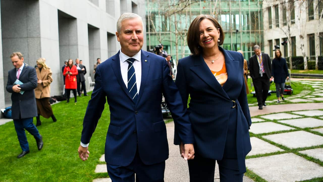 Former Nationals Leader Michael McCormack and his wife Catherine Shaw leave at the end of a press conference at Parliament House in Canberra, Monday, 21.6.21. 