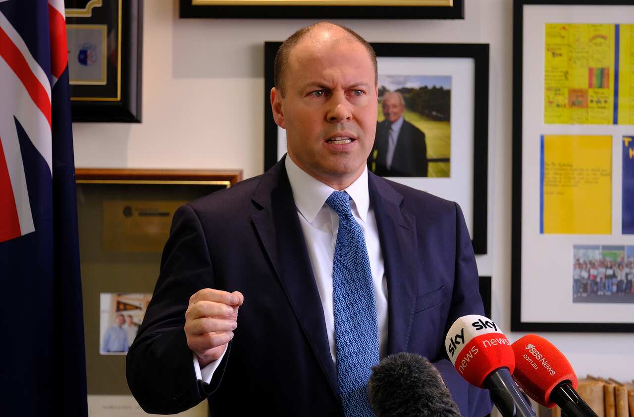 Australian Treasurer Josh Frydenberg speaks to the media during a press conference in Melbourne on Monday, July 26, 2021. (AAP Image/Luis Ascui) NO ARCHIVING