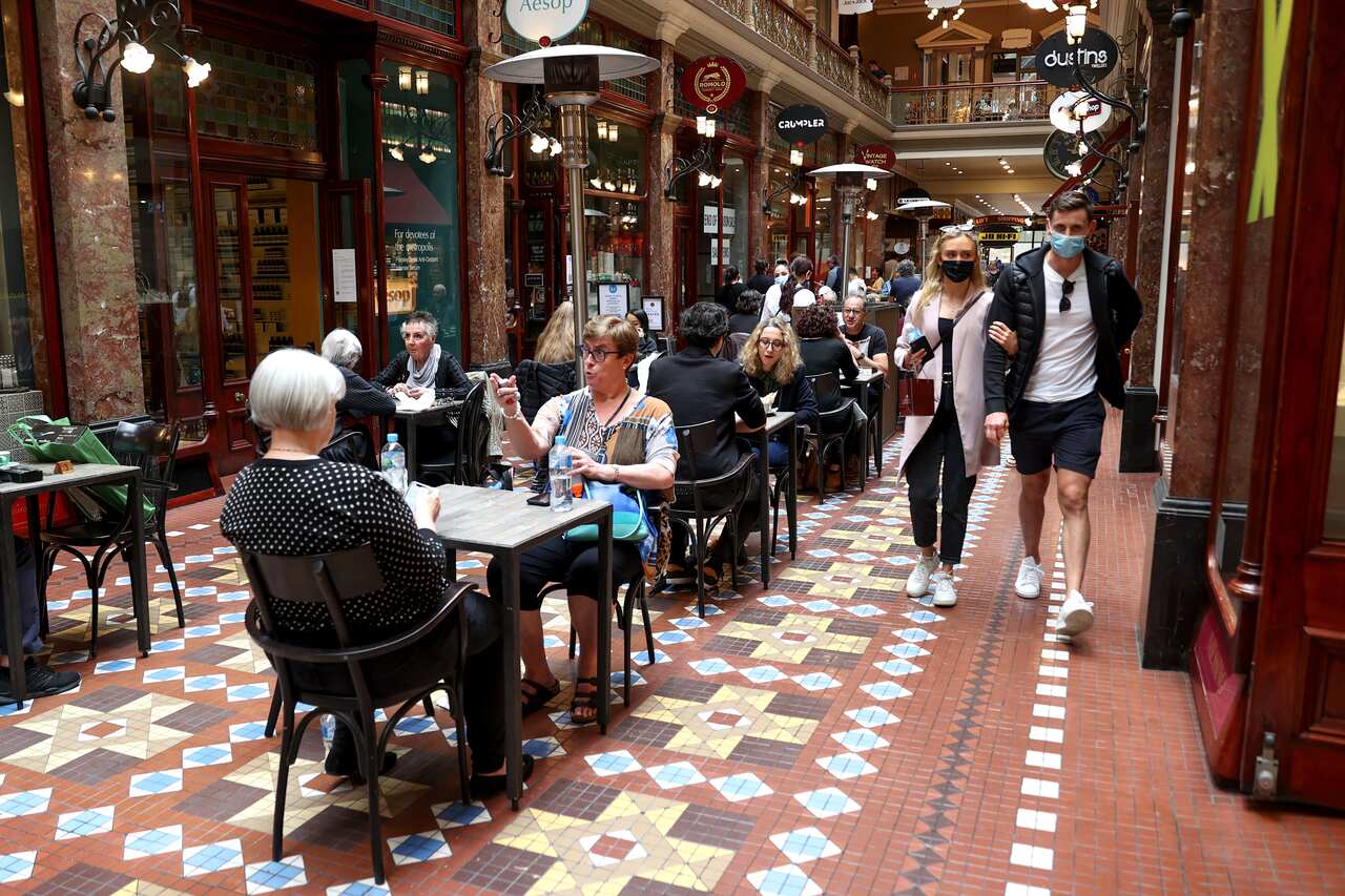 eople shop and dine at cafes inside Strand Arcade in Sydney, Saturday, October 16, 2021. After 106 days