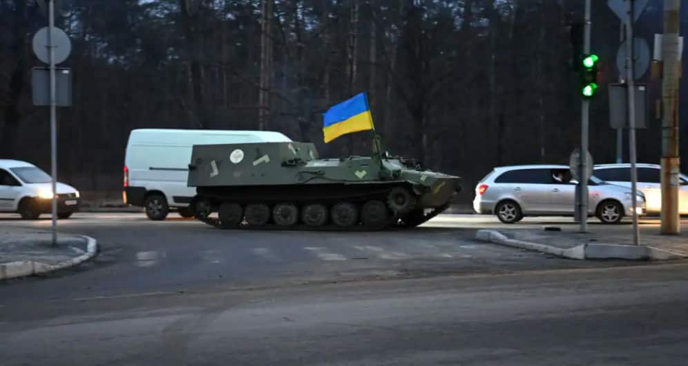 Russian and Ukrainian forces are battling for control of an airbase on the northern outskirts of Kyiv.