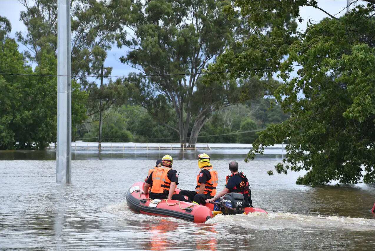 SES volunteers launch an inflatable rescue boat in Camden, South Western Sydney, on Tuesday, 8 March, 2022.