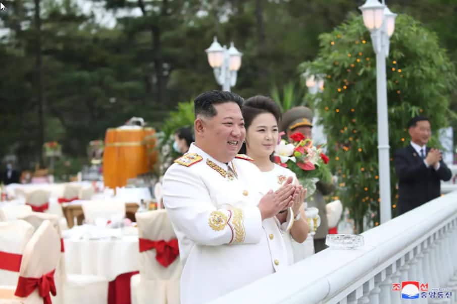 North Korean leader Kim Jong-un with his wife Ri Sol-ju attend a banquet to mark the 90th anniversary of North Korea's army in Pyongyan.