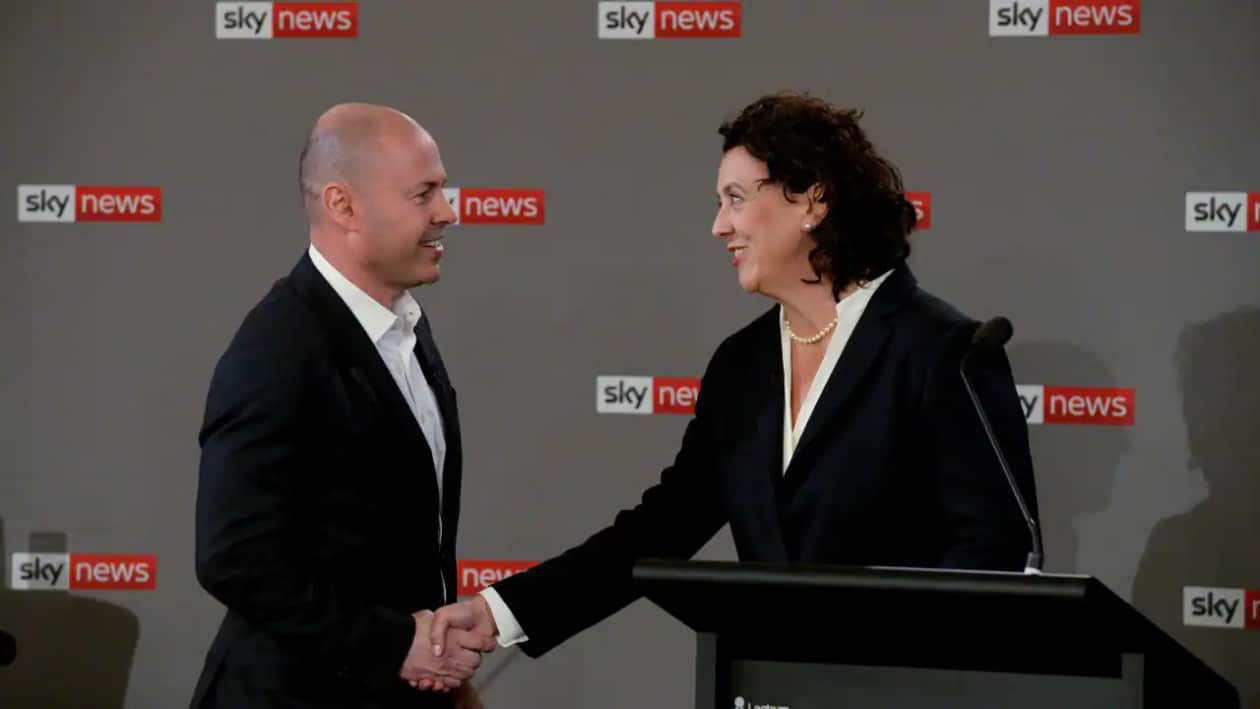 Treasurer Josh Frydenberg (left) and independent candidate for Kooyong Monique Ryan during a televised debate at Hawthorn Town Hall in Melbourne on Thursday.