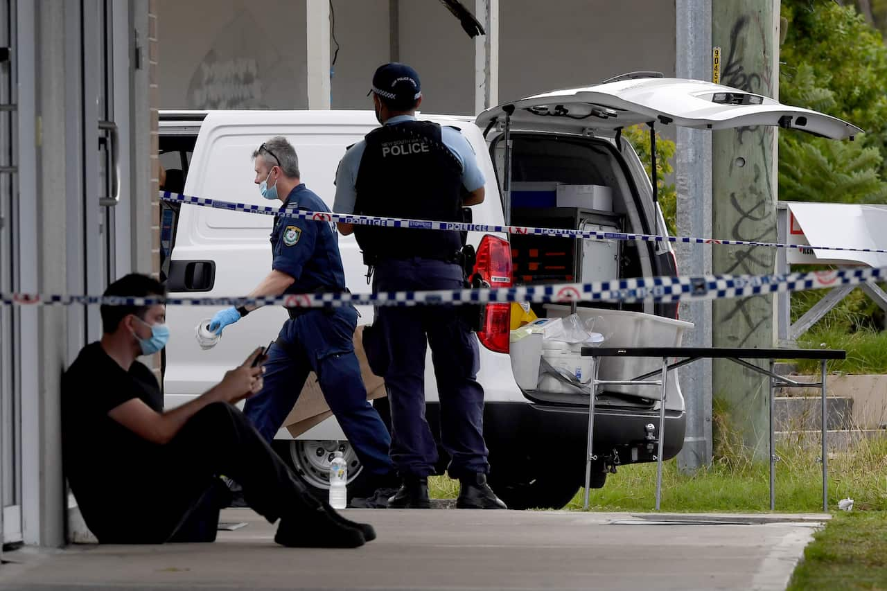 NSW Police Forensic officers and detectives are seen at the scene of a shooting on Rawson Road in south Wentworthville, Sydney, Thursday, January 6, 2022. Sydney's gang war has reignited again, after a man believed to be the brother of Brothers 4 Life gan