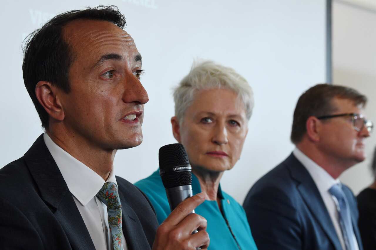 Candidates for the Wentworth by-election (lt-rt) Dave Sharma (Liberal Party), Dr. Kerry's Phelps (Independent) and Tim Murray (Labor Party) during a community forum at the Bondi Surf Bathers Lifesavers Club in Sydney, Monday, October, 15, 2018.