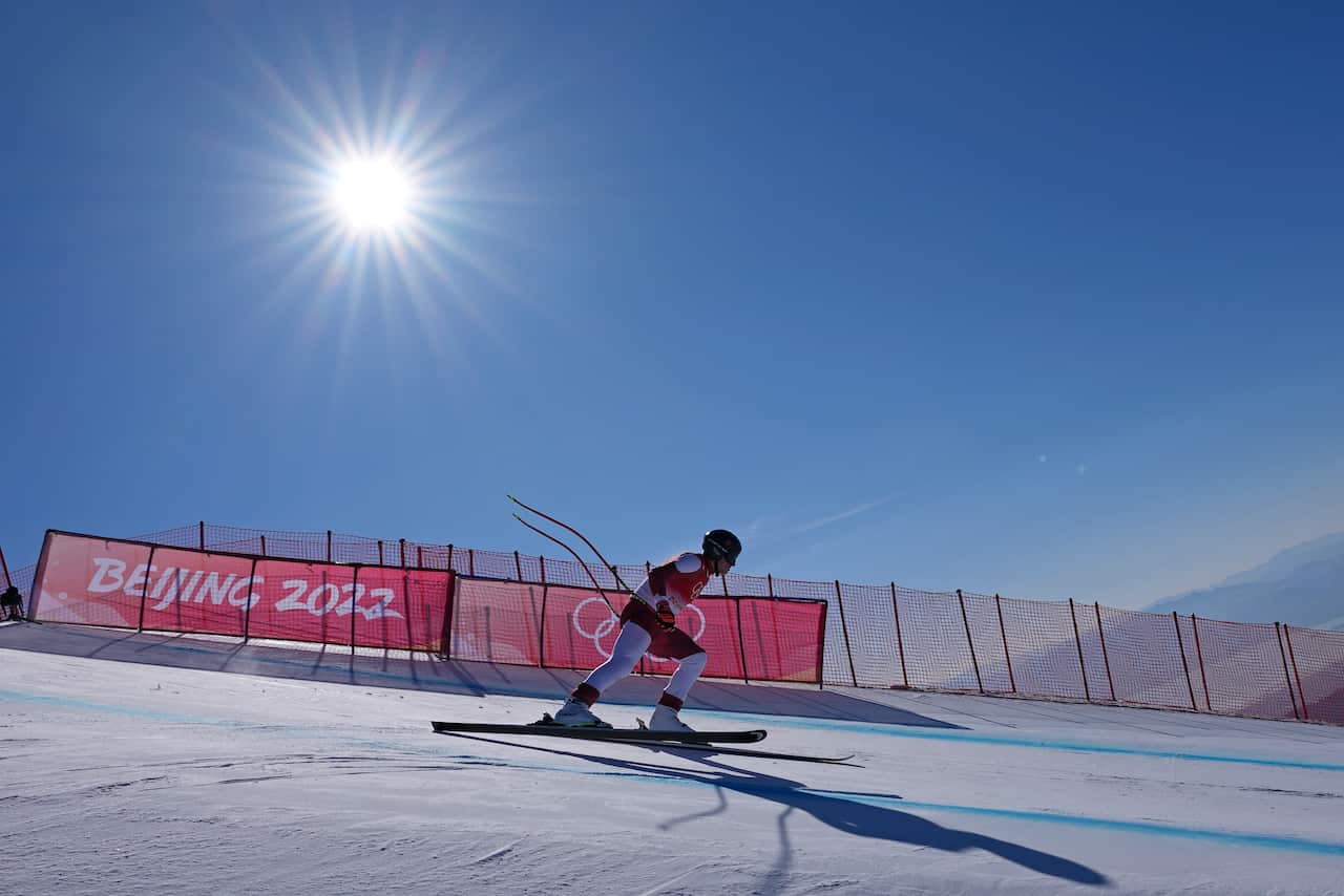 A mens downhill skier during a training run at the 2022 Winter Olympics, Thursday, February 3, 2022