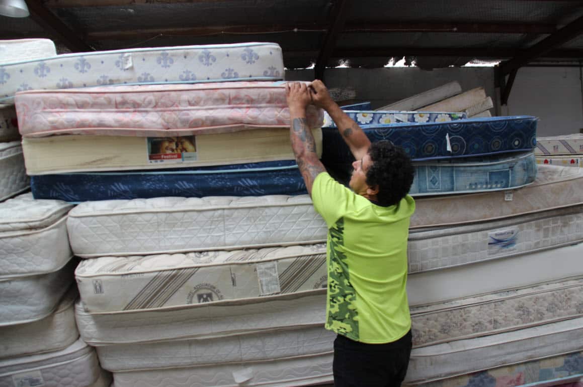 Mr Santoro at his mattress recylcing warehouse.