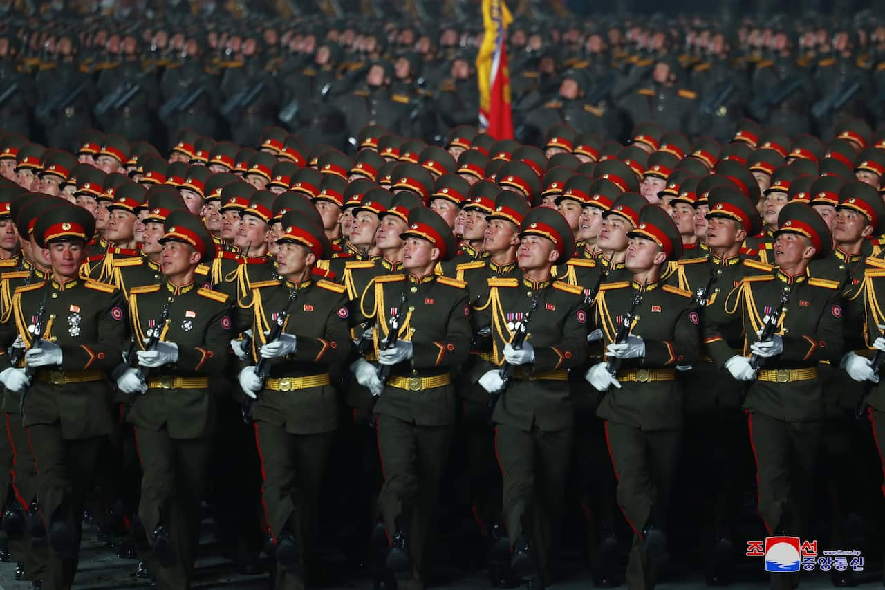 The military parade was held to mark the 8th Congress of the Workers' Party of Korea