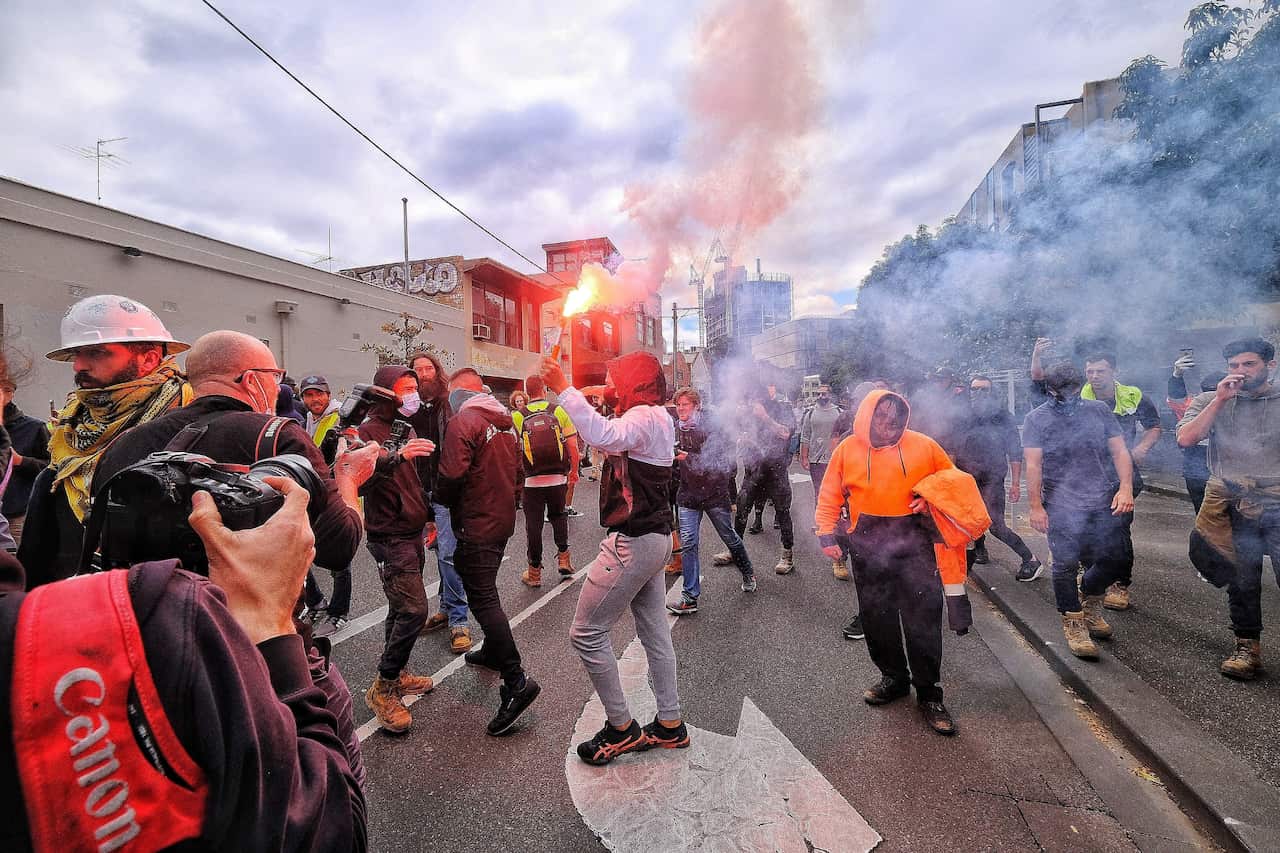 Protesters are seen in Melbourne, Wednesday, 22 September, 2021. 