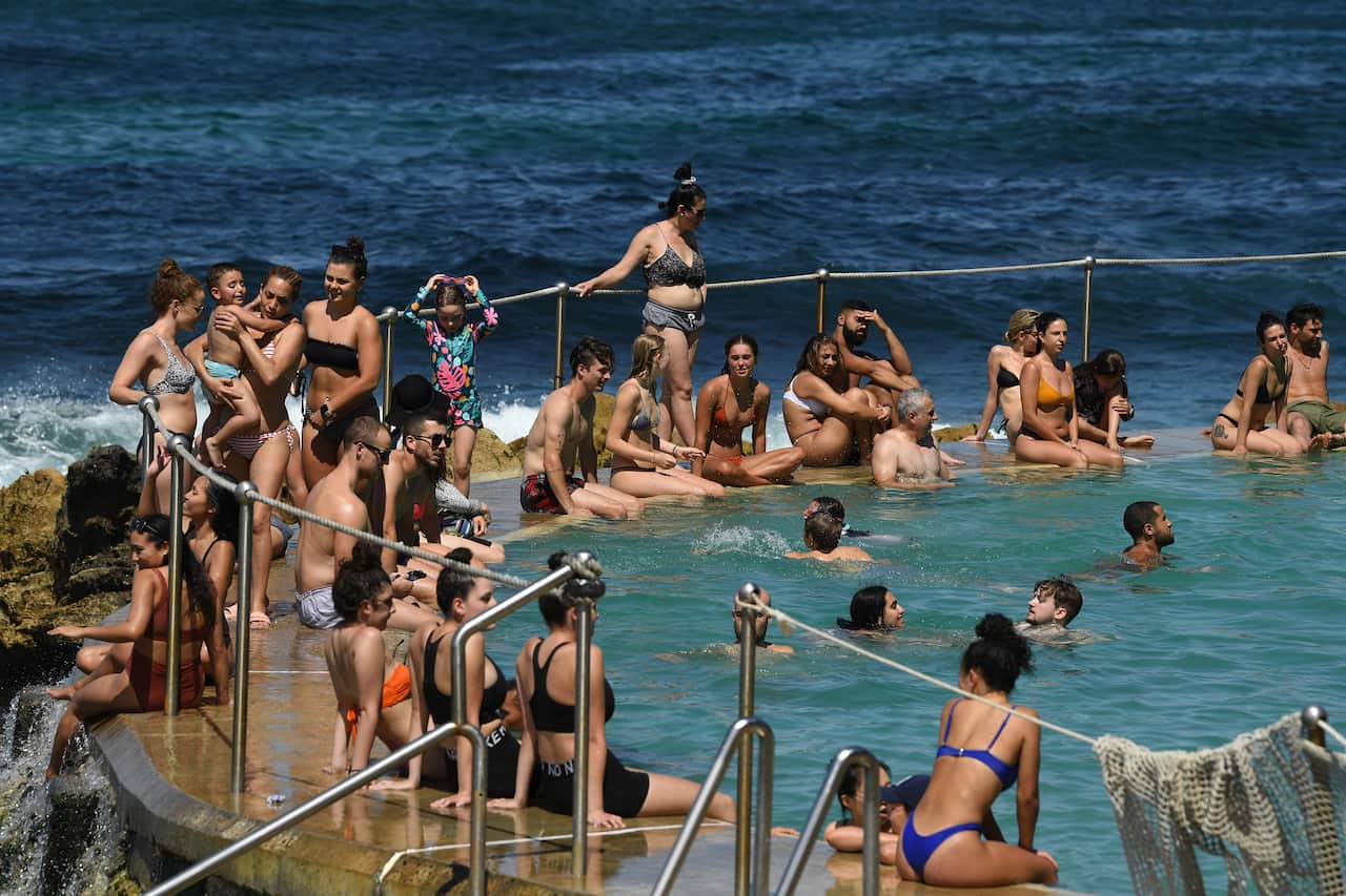 People cool off in the pool at Bronte Beach in Sydney on Saturday, 28 November.
