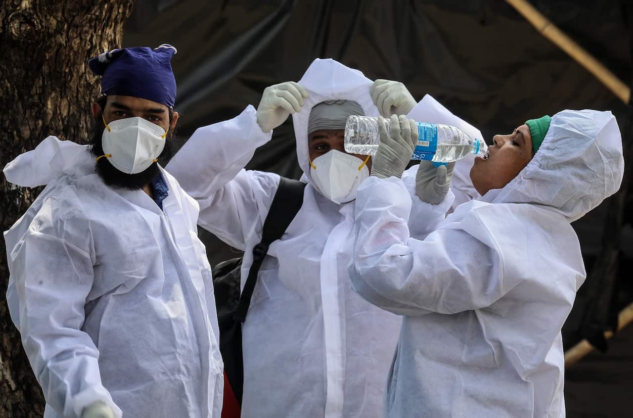 Health workers at a COVID-19 centre in Mumbai, India on 24 May 2021.  