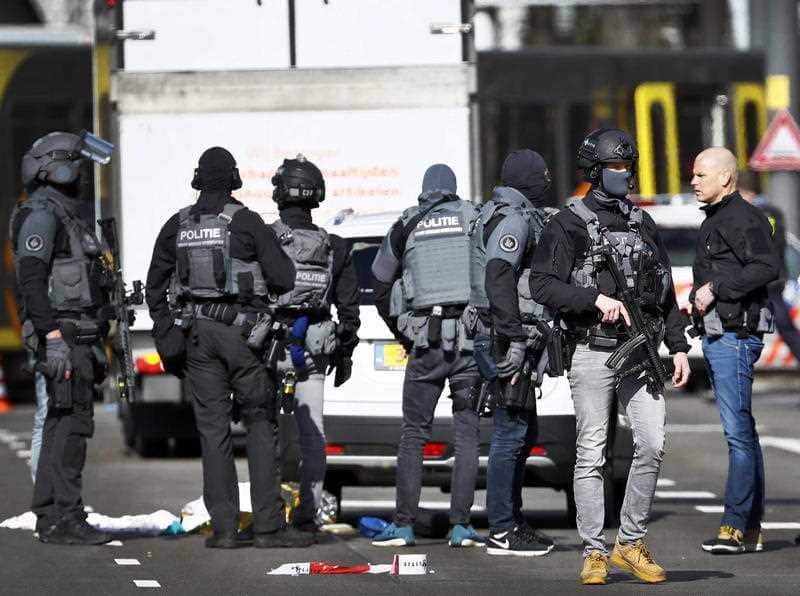 Armed police at the scene where a shooting took place at the 24 Oktoberplace in Utrecht.
