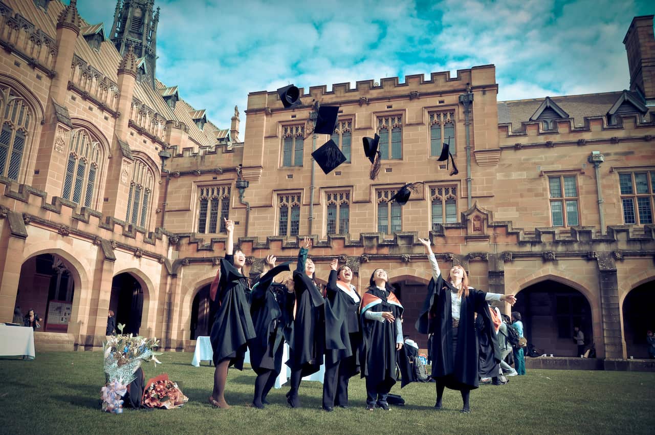 Graduation Hat Throw - so cliche