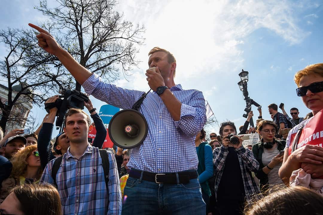 Alexei Navalny speaks to supporters during an opposition rally before he was detained by police in Moscow.