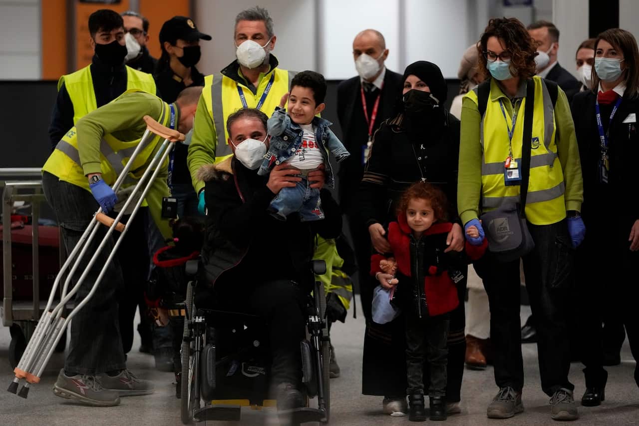 The Al-Nazzal family upon their arrival in Rome.