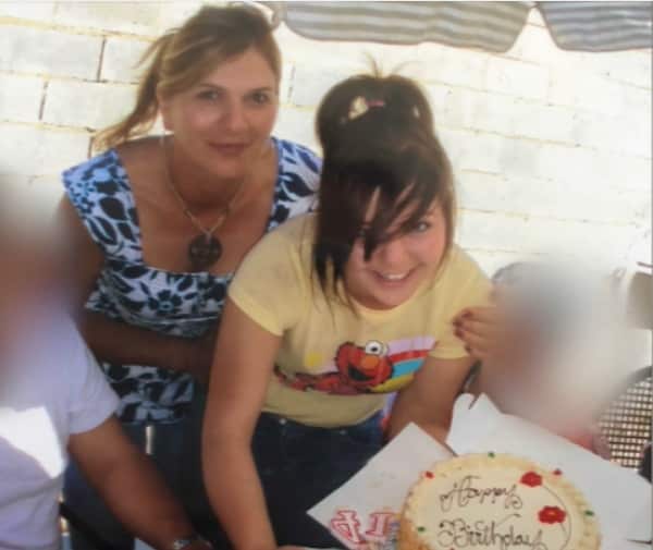 Duman as a teenager with her mother.