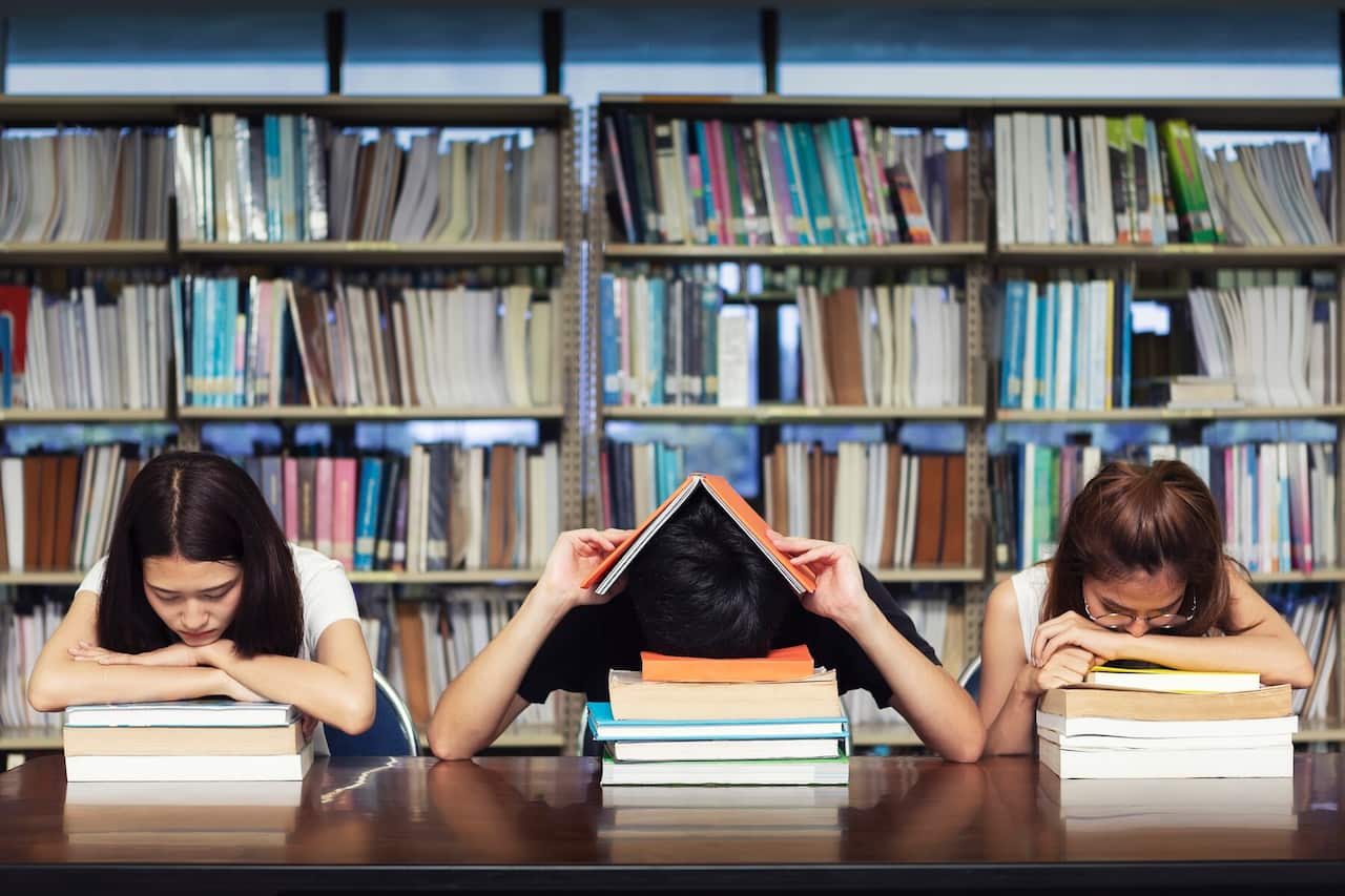 Stressed students in the library